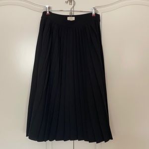 Kate Spade pleated black mid length skirt, size 8